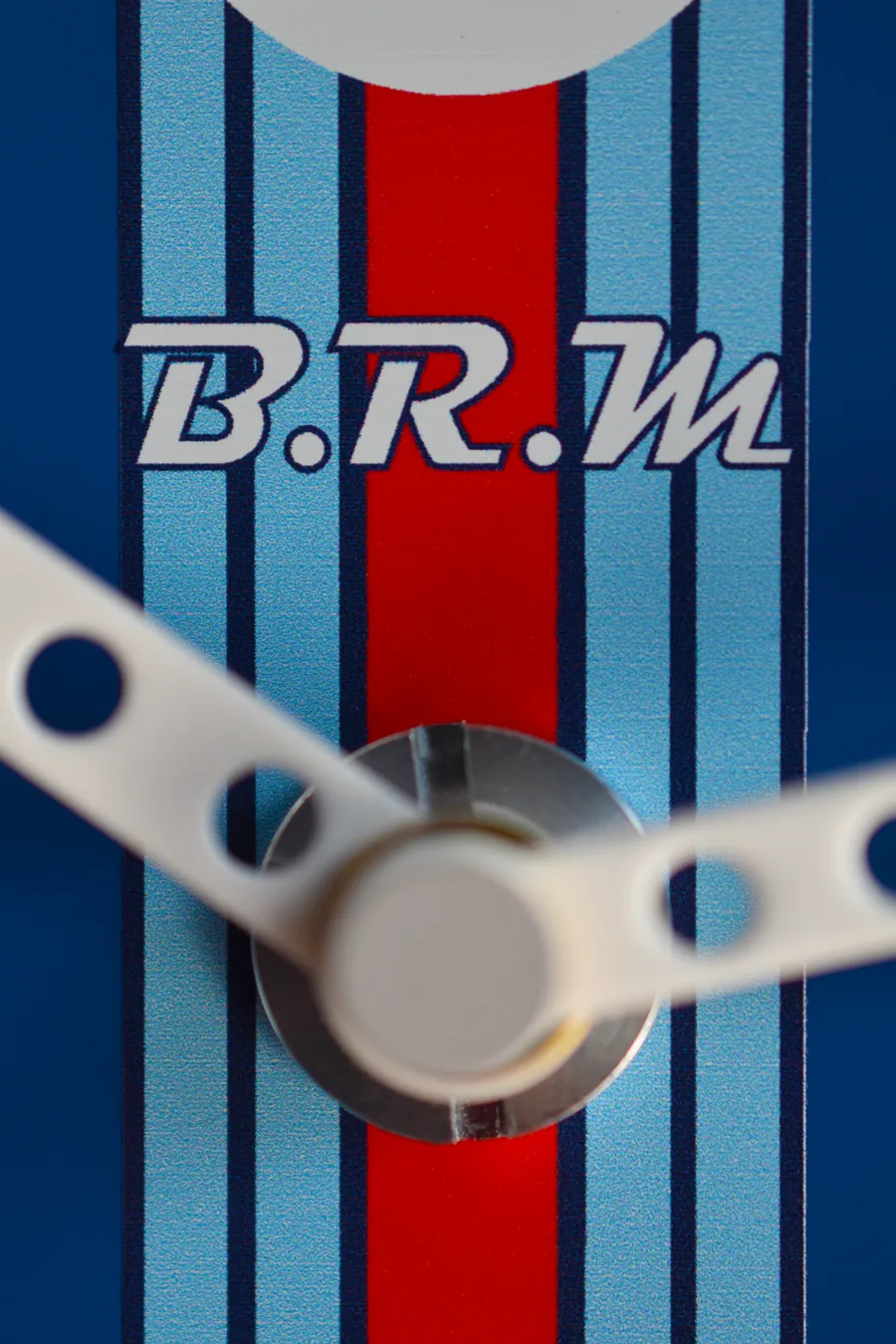 The Martini stripes and the hands on the dial
